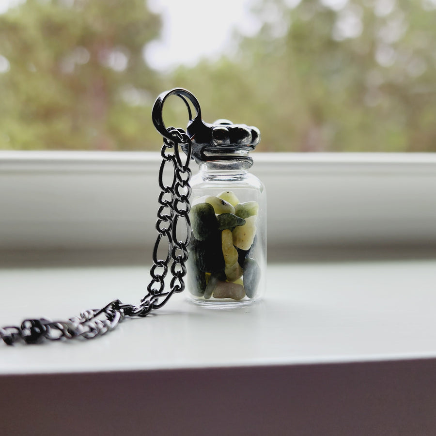 Vintage Glass Bottle with Green Gemstones