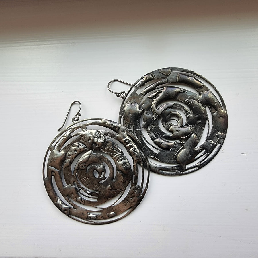 Handmade Silver Hoop Earrings. Heavy Statement Earrings. Truly hand made in USA by Louisiana artisan at Bayou Glass Arts studio.